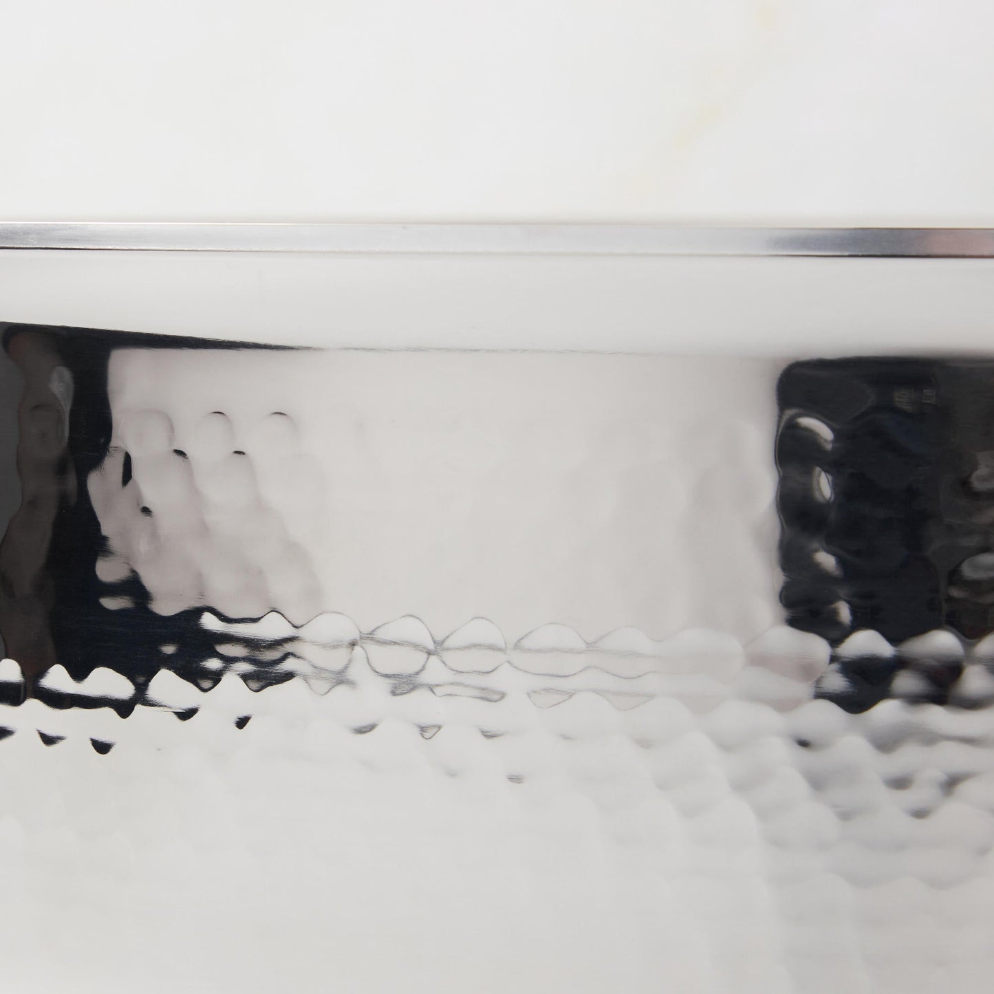 Hammering increases strength and beauty of clad stainless steel stockpot from Ruffoni