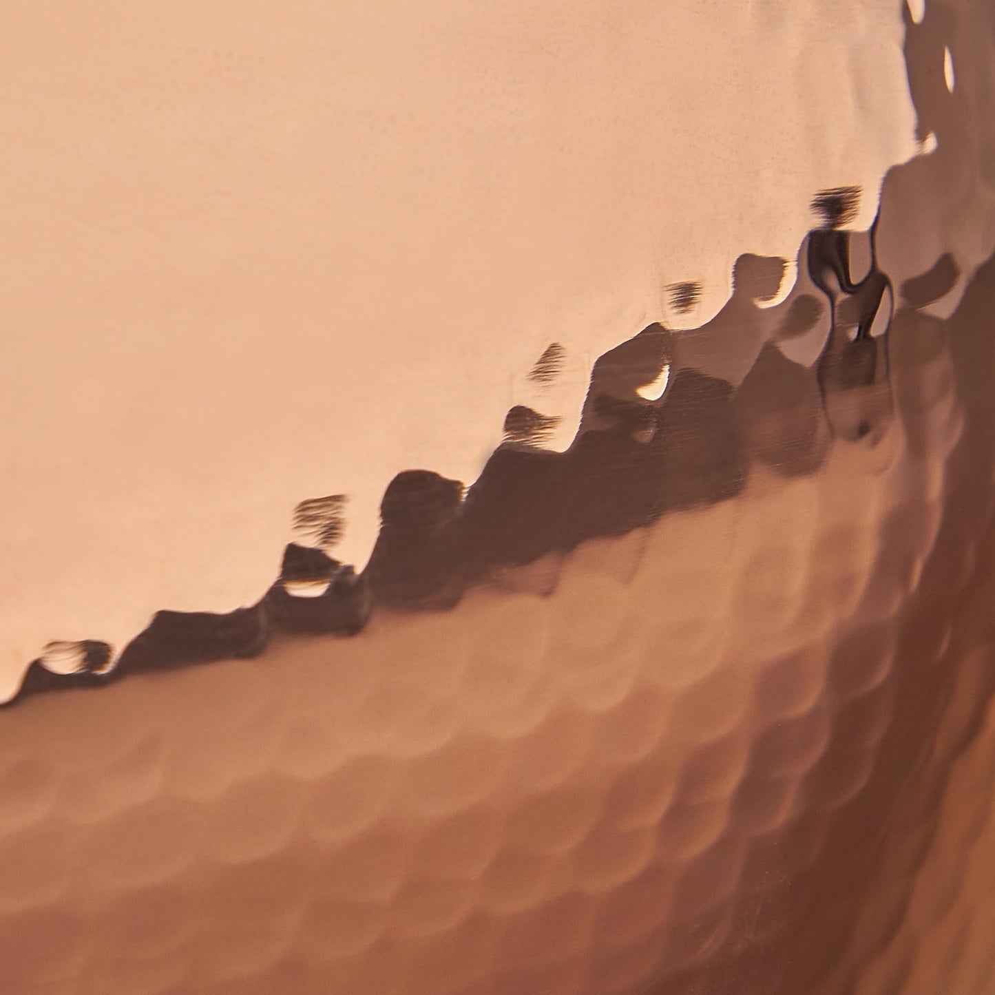 Signature hammering finish on copper Polenta Pot from Ruffoni Historia, applied to ensure increased strength and lasting beauty