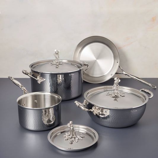 7-piece set Disney x Ruffoni Opus Prima hammered clad stainless steel with special edition Disney-inspired knobs in stainless steel featuring Mickey Mouse, Minnie Mouse, and Pluto by Ruffoni