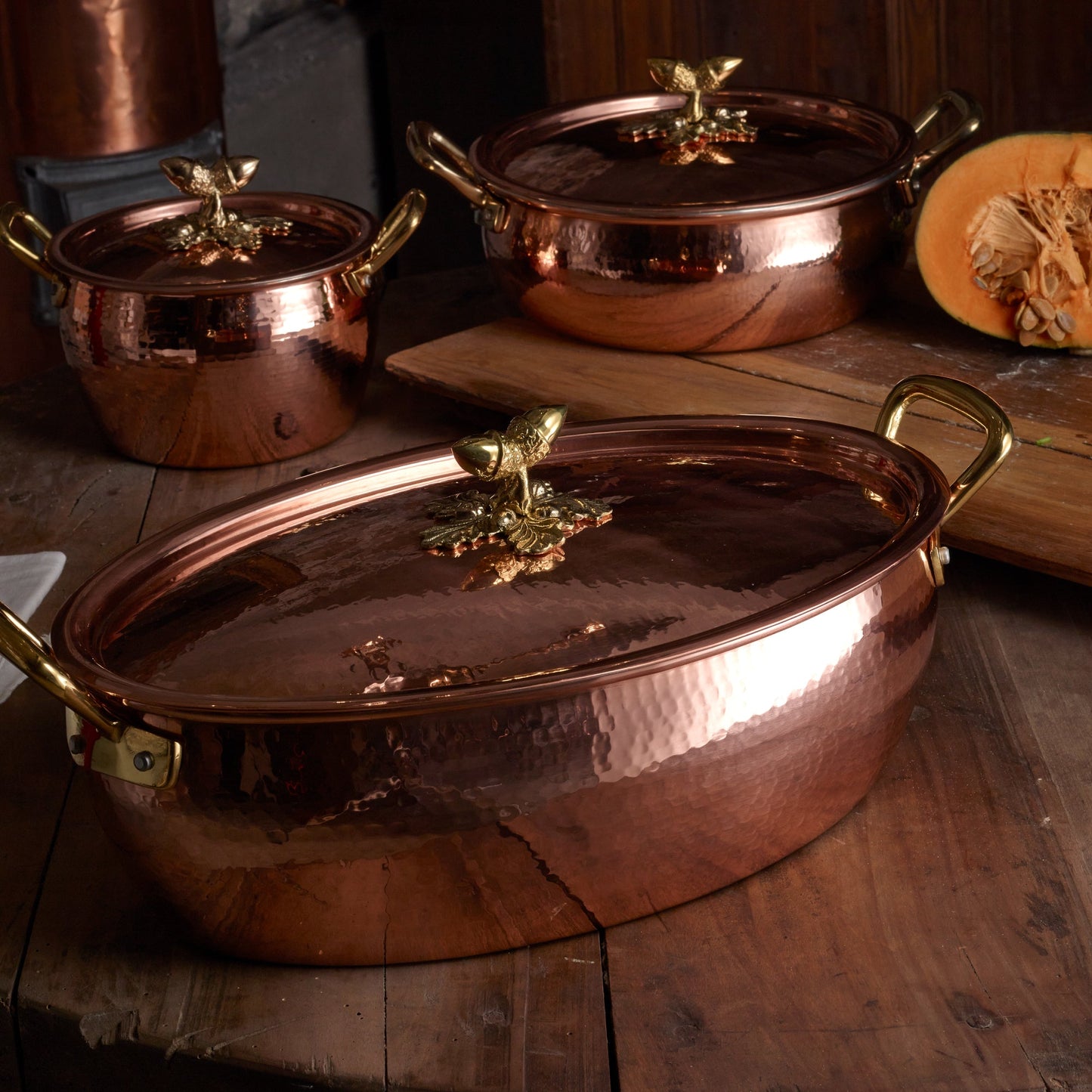 Hammered copper 8 Qt Oval Casserole lined with high purity tin applied by hand over fire and bronze handles, from Ruffoni Historia collection