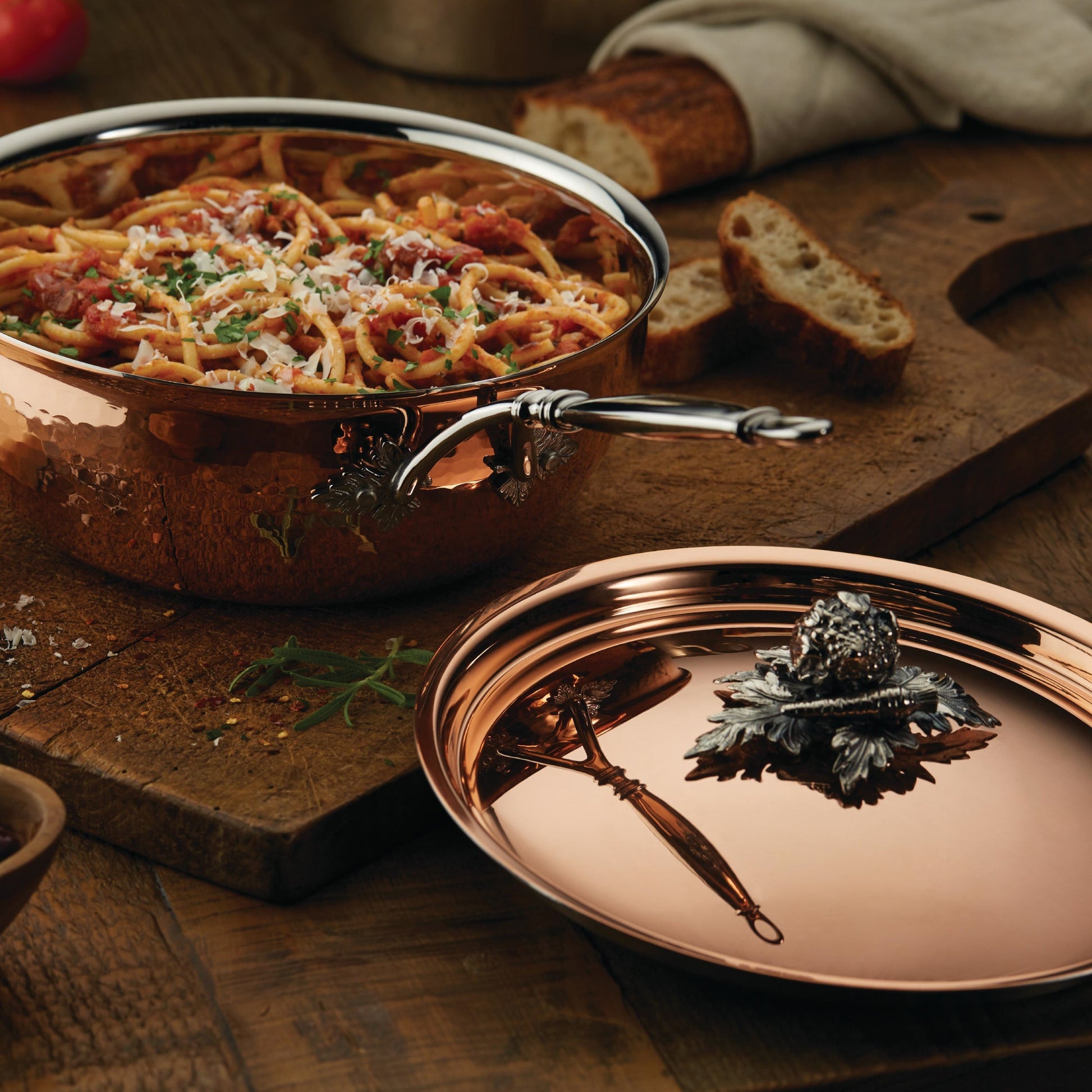 Opus Cupra hammered copper with stainless steel lining and decorated silver-plated lid knob finial from Ruffoni