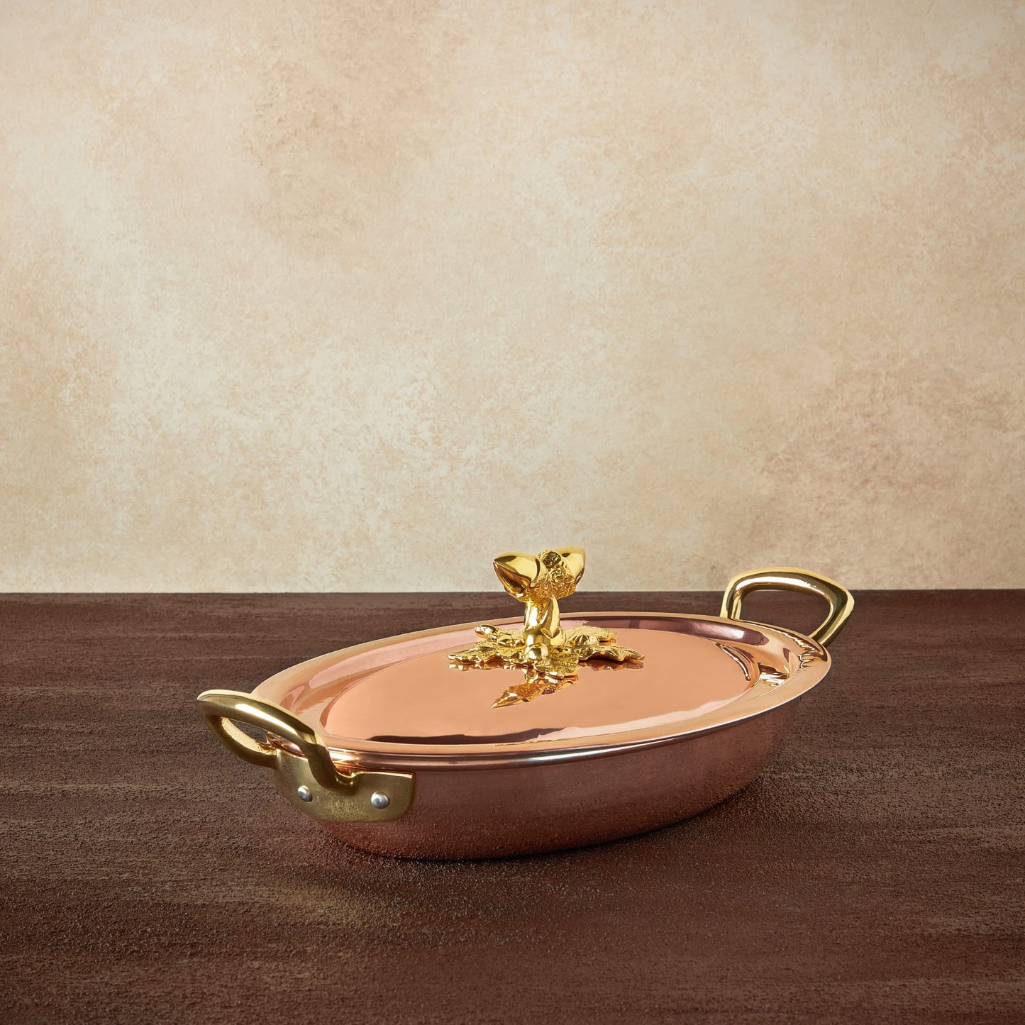 Hammered copper 11" Covered Oval Gratin lined with high purity tin applied by hand over fire and bronze handles, from Ruffoni Historia collection