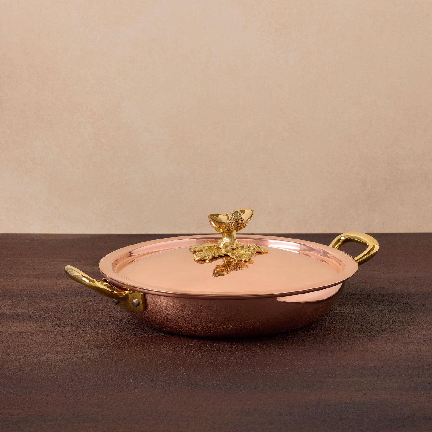 A classic with a twist - Ruffoni copper frying pan with two side handles to ensure a convenient and elegant transition from stovetop to oven and tabletop. Explore timeless craftsmanship now