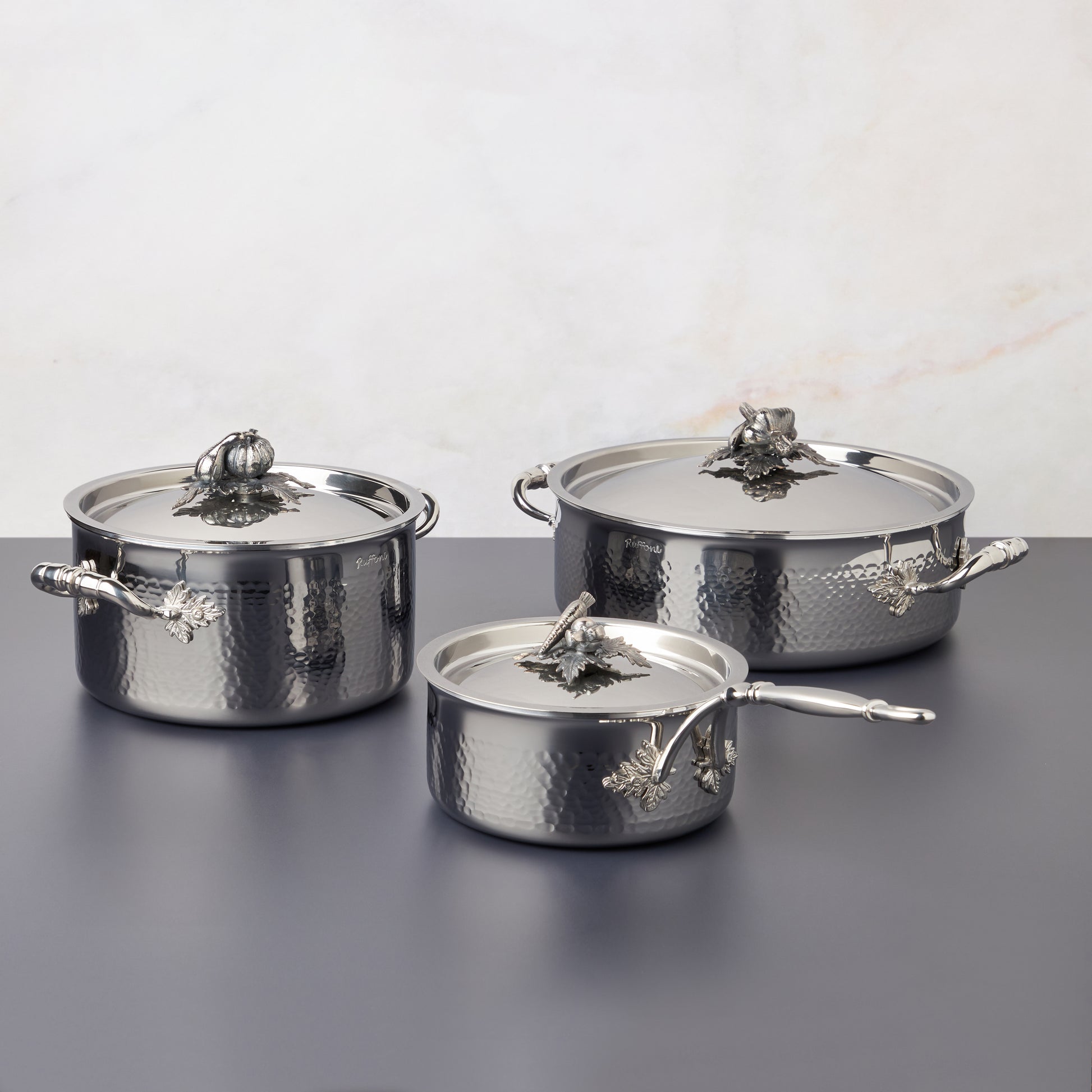 Opus Prima hammered clad stainless steel 6 piece cookware set with decorated silver-plated lid knob finial from Ruffoni