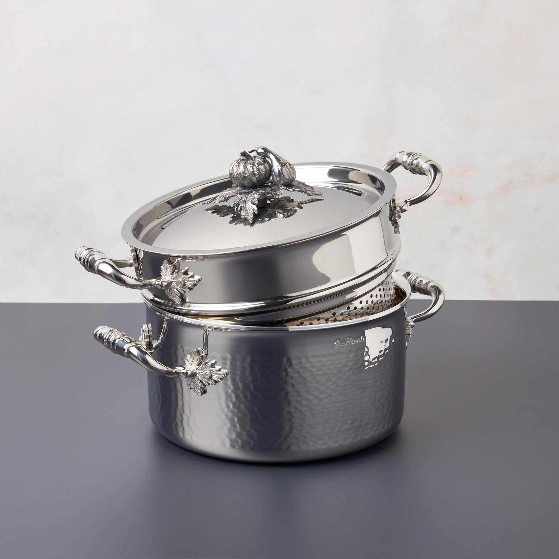 Opus Prima hammered clad stainless steel soup pot with decorated silver-plated lid knob finial from Ruffoni