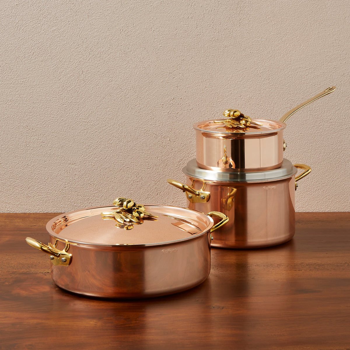 Ruffoni Olivia Cupra 6-piece copper cookware set with stainless steel lining, brass handles and decorated lids with brass olive and leaf knob finials