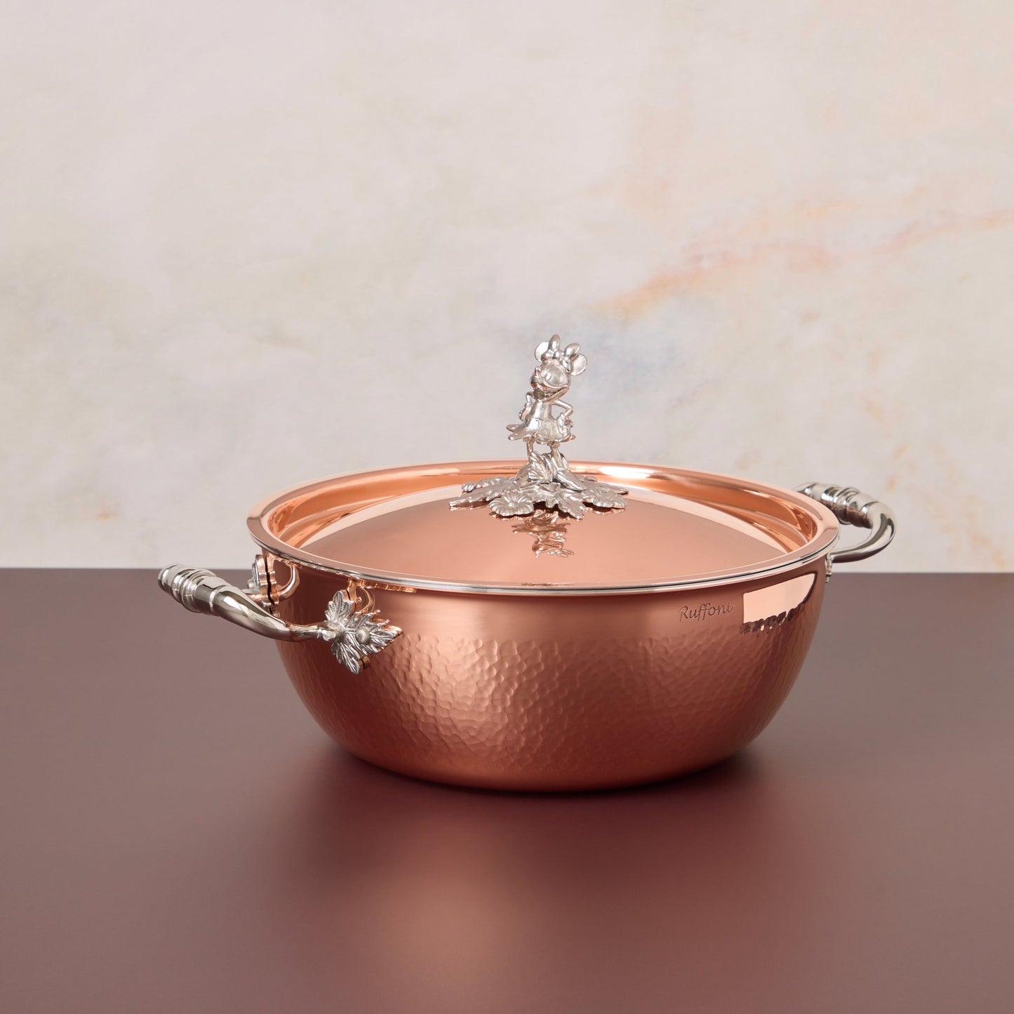 Disney x Ruffoni Opus Cupra 4 qt chef pot hammered copper with special edition Disney-inspired knobs in stainless steel featuring Minnie Mouse, by Ruffoni
