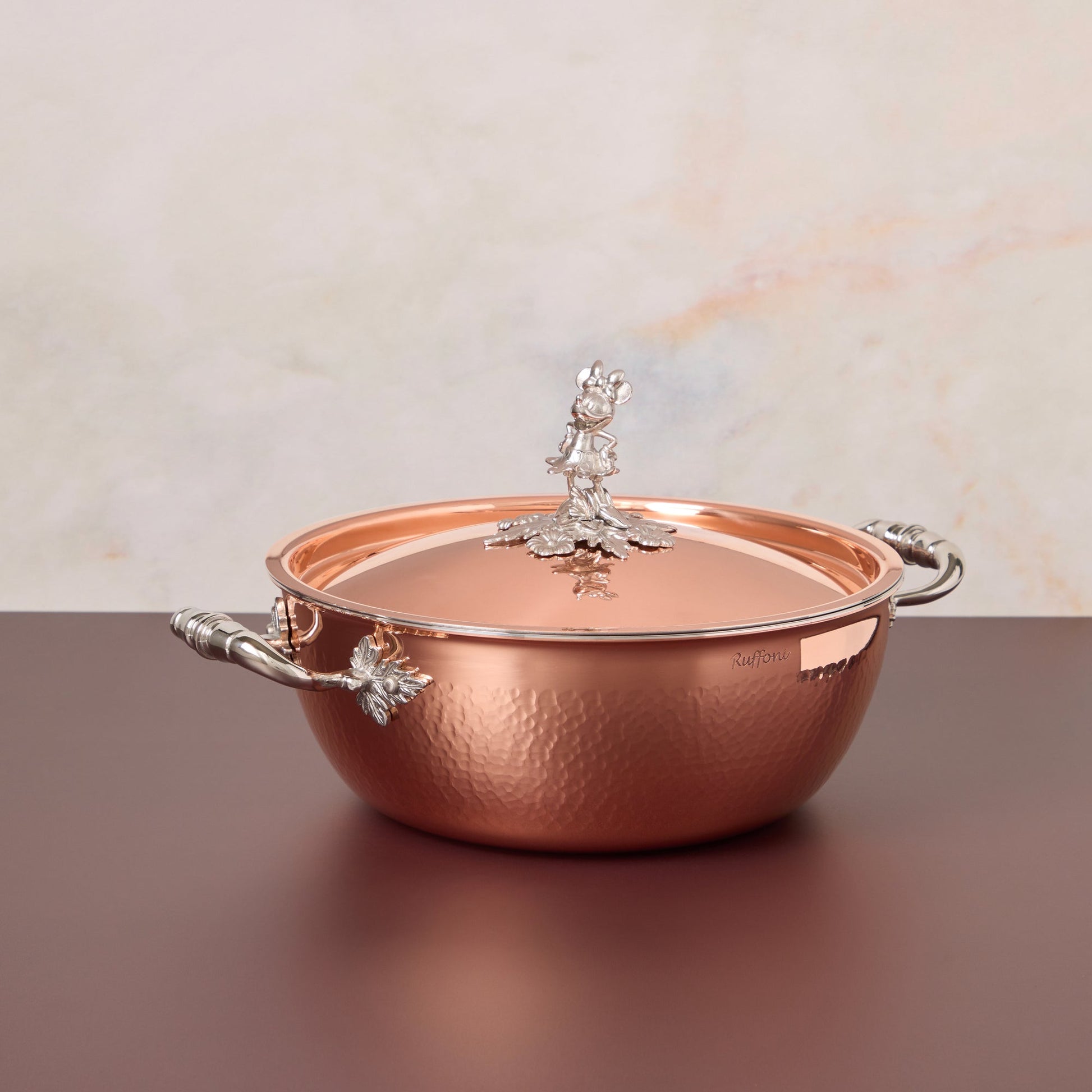 Disney x Ruffoni Opus Cupra 4 qt chef pot hammered copper with special edition Disney-inspired knobs in stainless steel featuring Minnie Mouse, by Ruffoni

