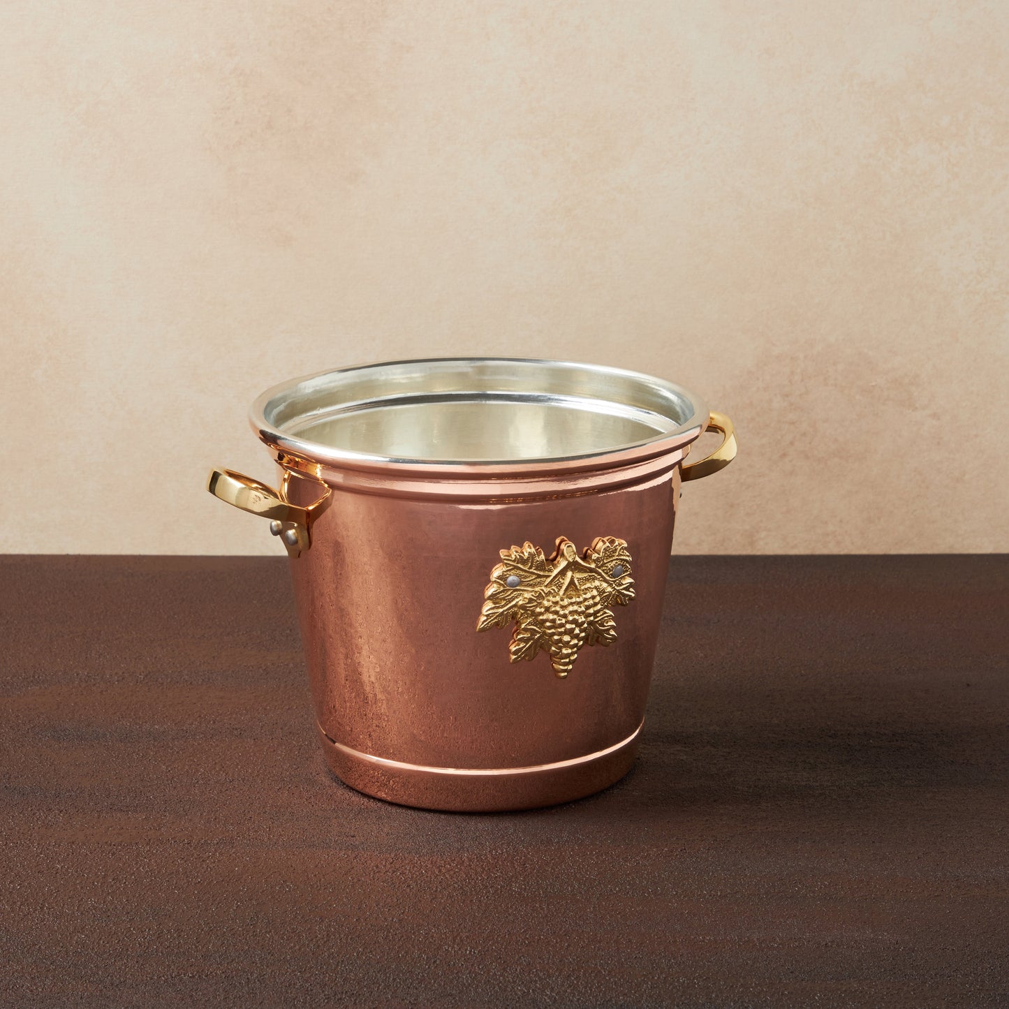 Hammered copper 3.5 Qt Round Wine Bucket lined with high purity tin applied by hand over fire and bronze handles, from Ruffoni Historia collection