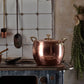 Hammered copper 12 Qt Stockpot lined with high purity tin applied by hand over fire and bronze handles, from Ruffoni Historia collection